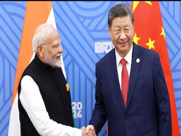 চিনা প্রেসিডেন্ট শি জিনরপিংয়ের সঙ্গে প্রধানমন্ত্রী নরেন্দ্র মোদি৷  ছবি- পিটিআই