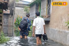 জলে ভাসছে আবর্জনা, মানুষের মল! জুতো হাতে খালি পায়ে তার উপর দিয়েই স্কুলমুখী পড়ুয়ারা