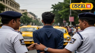 পুলিশের হাতে গ্রেফতার যুবক। ছবি সৌজন্যেঃ এআই