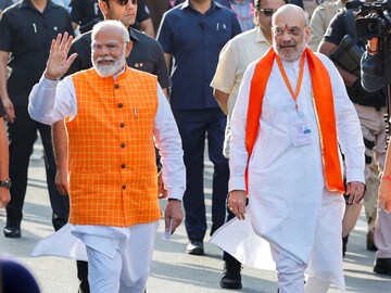 প্রধানমন্ত্রী মোদির নেতৃত্বশৈলীর প্রশংসা অমিত শাহের (File Photo/Reuters)