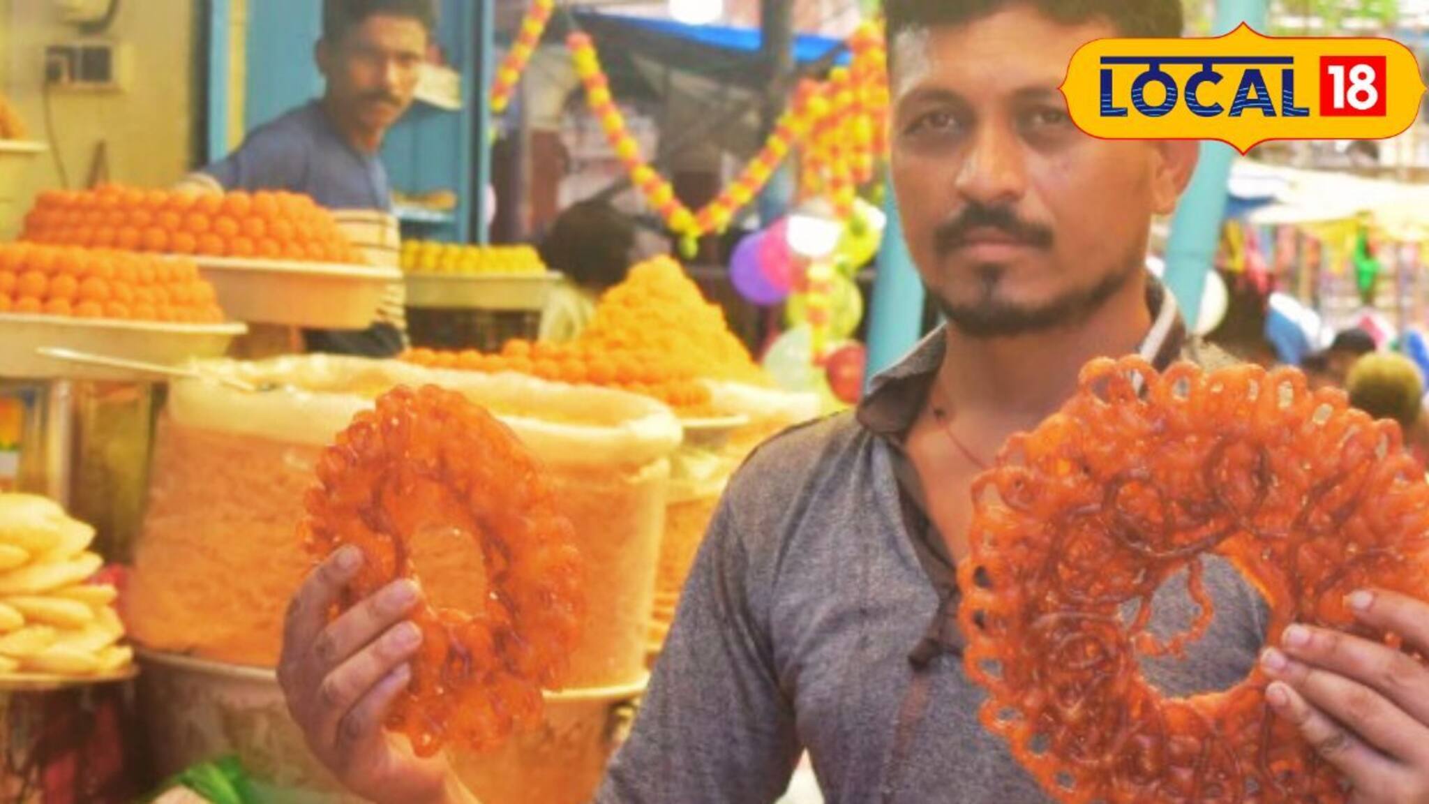 হাত জুড়ে জাম্বো জিলিপি,কামড়াতে গেলেও বেগ পেতে হবে! রসে টইটুম্বুর,পুরুলিয়ার বিশেষ আকর্ষণ