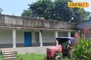 সরকারি স্কুলের মাঠে দাঁড়িয়ে ট্রাক্টর, বারান্দায় শুকাচ্ছে ঘুঁটে, ঝোপঝাড়...! কোথায় জানেন?