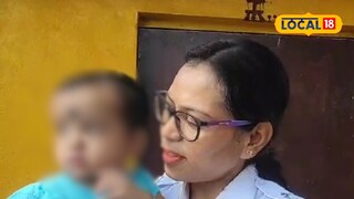 পুলিশ কর্মীর কোলে এসএসসি পরীক্ষার্থীর সন্তান