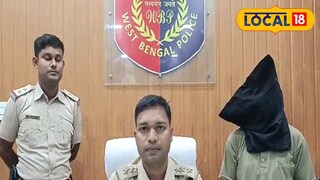 কালো কাপড়ে মুখ ঢাকা অভিযুক্ত।