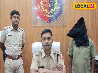 কালো কাপড়ে মুখ ঢাকা অভিযুক্ত।