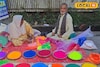 দীপাবলির আগে রঙ্গোলি বেচতে শহরে হাজির উত্তরপ্রদেশের দম্পতি! কত করে বিক্রি হচ্ছে জানুন