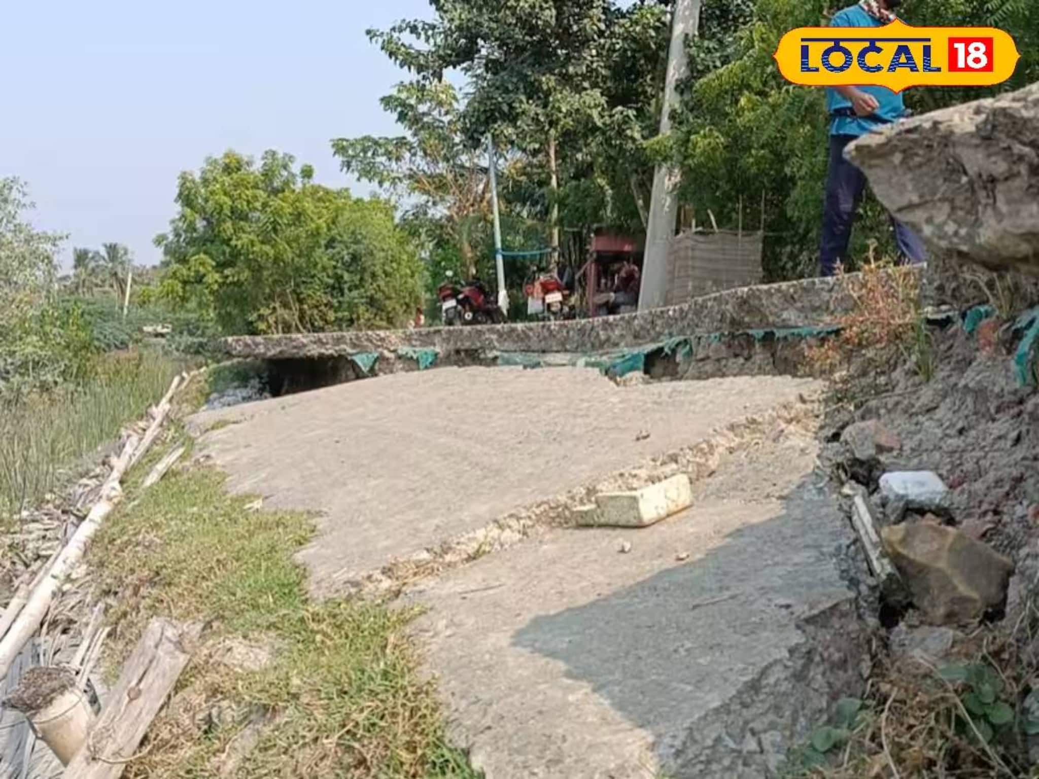 North 24 Parganas News: পর্যটনের মরসুমে সুন্দরবন এলাকায় নদী ভাঙনের আশঙ্কা! ঢালাই রাস্তার নীচ থেকে সরল মাটি, নদী বাঁধ বসে গিয়ে ভয়াবহ অবস্থা, দেখুন ভিডিও