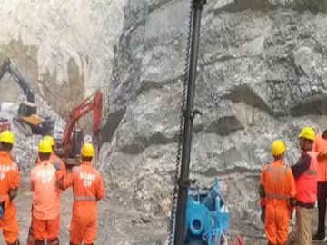 Heavy machinery and specialised personnel have been deployed to clear debris. (Image Credit: ANI) Heavy machinery and specialised personnel have been deployed to clear debris. (Image Credit: ANI)