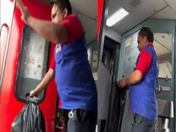 ভারতীয় রেলে OBHS কর্মীর ট্রেন থেকে আবর্জনা ফেলা, ভাইরাল ভিডিওয় বিতর্ক ভারতীয় রেলে OBHS কর্মীর ট্রেন থেকে আবর্জনা ফেলা, ভাইরাল ভিডিওয় বিতর্ক