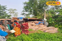 দুর্ঘটনার কবলে রেশনের চাল বোঝাই লরি! রাস্তায় ছড়িয়ে বস্তা, আনা হল ক্রেন