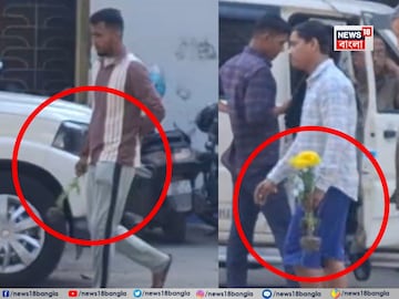 ফুল গাছ হাতেই পুলিশের জিপে উঠলেন ধৃত দুই মেসি ভক্ত৷ ফুল গাছ হাতেই পুলিশের জিপে উঠলেন ধৃত দুই মেসি ভক্ত৷