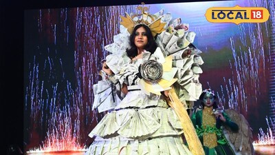 ফেলে দেওয়া কাগজের টুকরো দিয়ে বানানো আধুনিক পোশাক