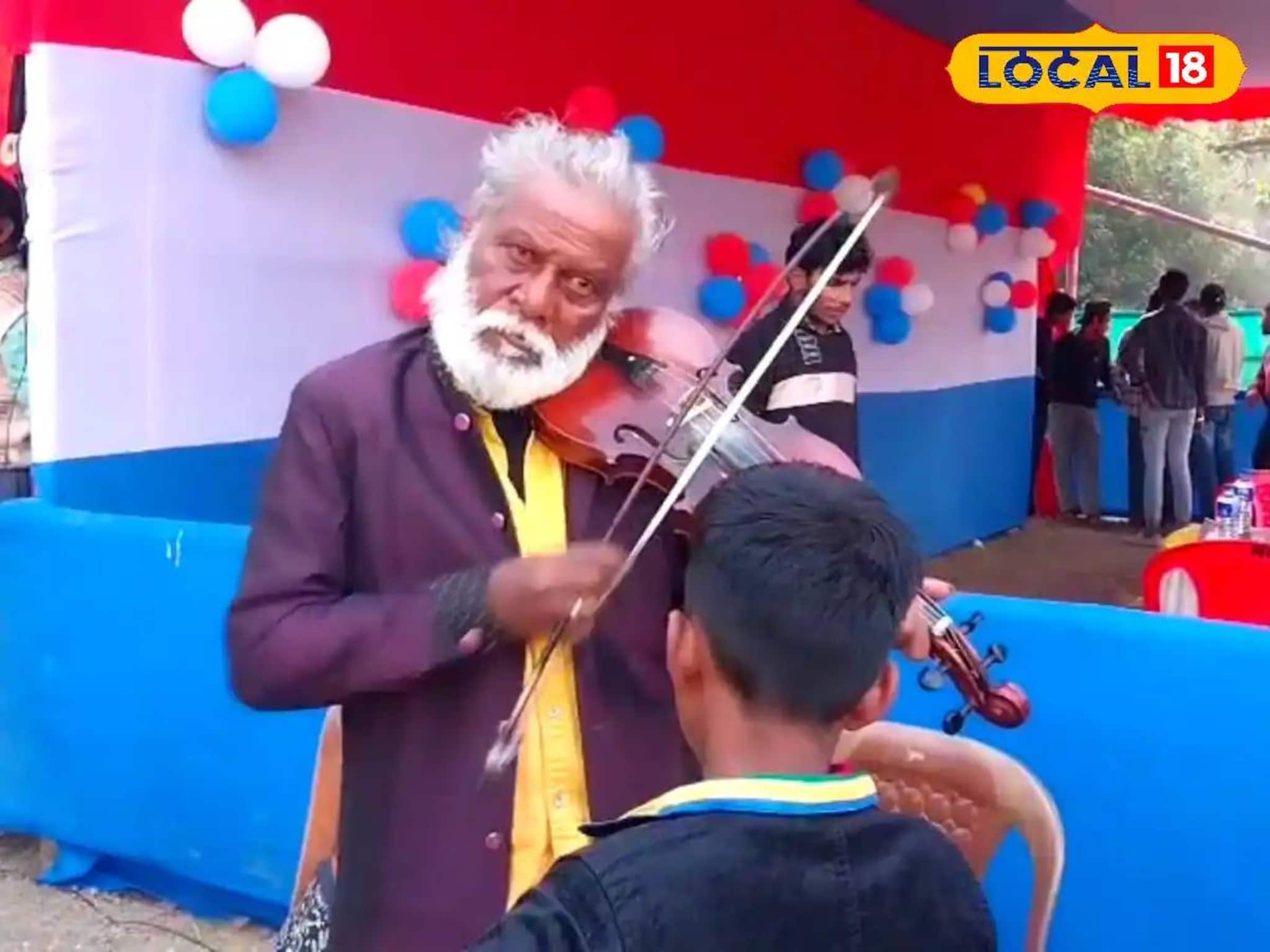 বিদেশি স্টাইলে বেহালা বাজিয়ে মন জয় করছেন ষাটোর্ধ্ব শিল্পী! মধুর সুরে মুগ্ধ সকলে