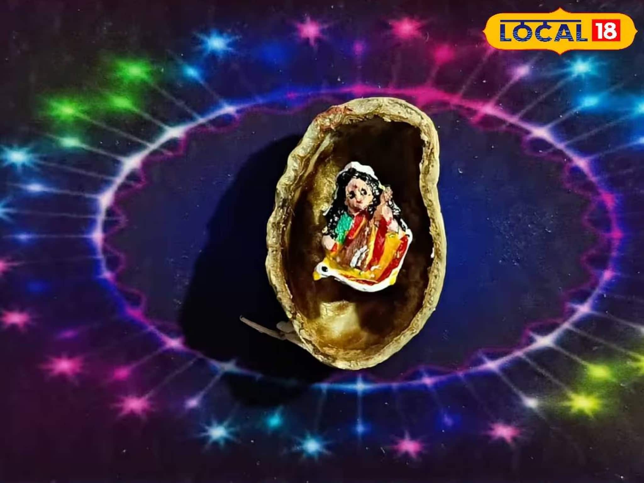 বাদামের খোলায় বিদ্যার দেবী! ১২ মিলিমিটারের সরস্বতী বানিয়ে রেকর্ড গড়লেন নবদ্বীপের শিল্পী বাদামের খোলায় বিদ্যার দেবী! ১২ মিলিমিটারের সরস্বতী বানিয়ে রেকর্ড গড়লেন নবদ্বীপের শিল্পী
