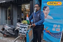 Siliguri News: উন্নয়নের জোয়ারে কোণঠাসা প্রকৃতি! ব্যস্ত রাজপথে গাছ ও অক্সিজেন মাস্কে নীরব প্রতিবাদ ব্যক্তির, অভিনব কায়দায় সবুজ বাঁচানোর ডাক