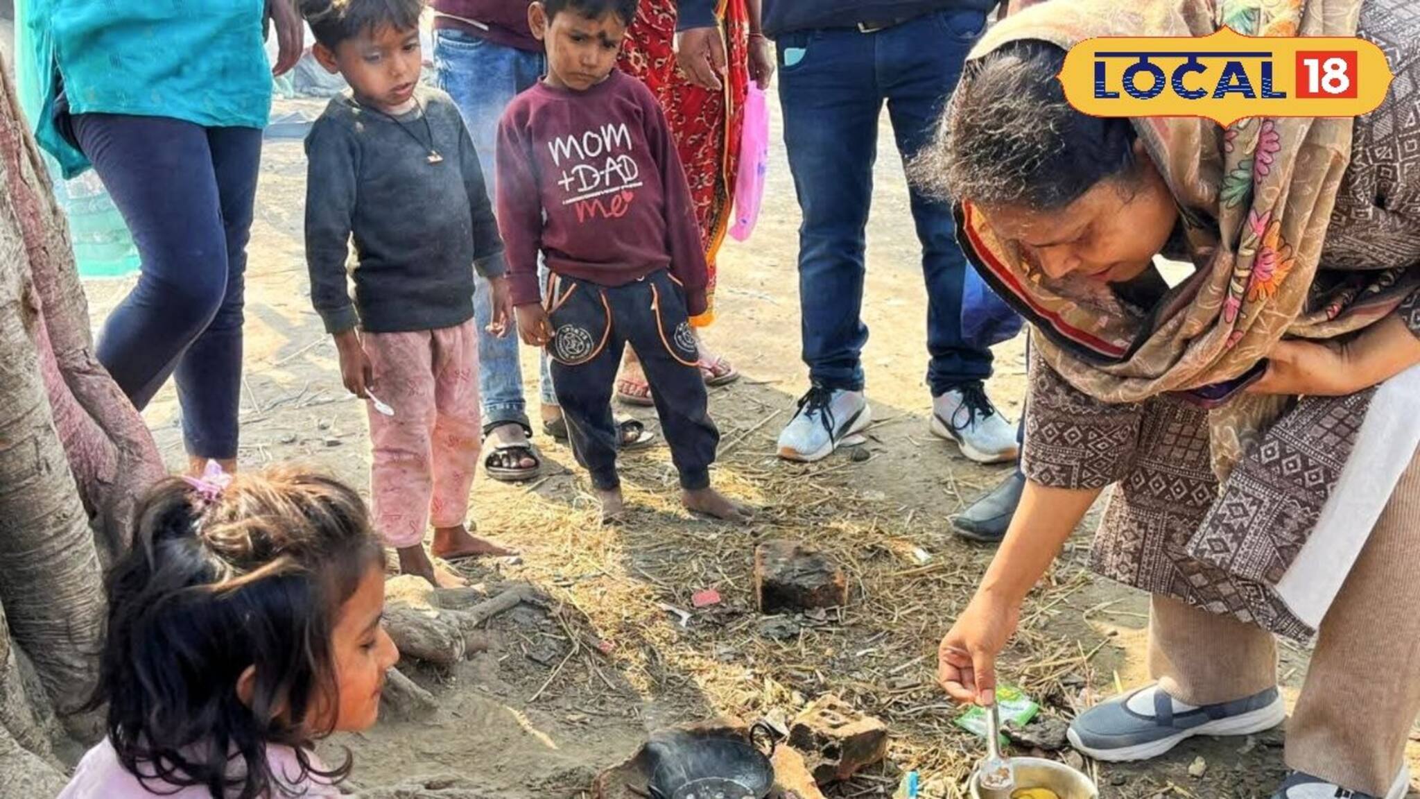 কনভয় থামিয়ে শিশুদের বনভোজনে সামিল স্বয়ং রাজ্যের মন্ত্রী, ধরলেন খুন্তি, দেখুন ভিডিও