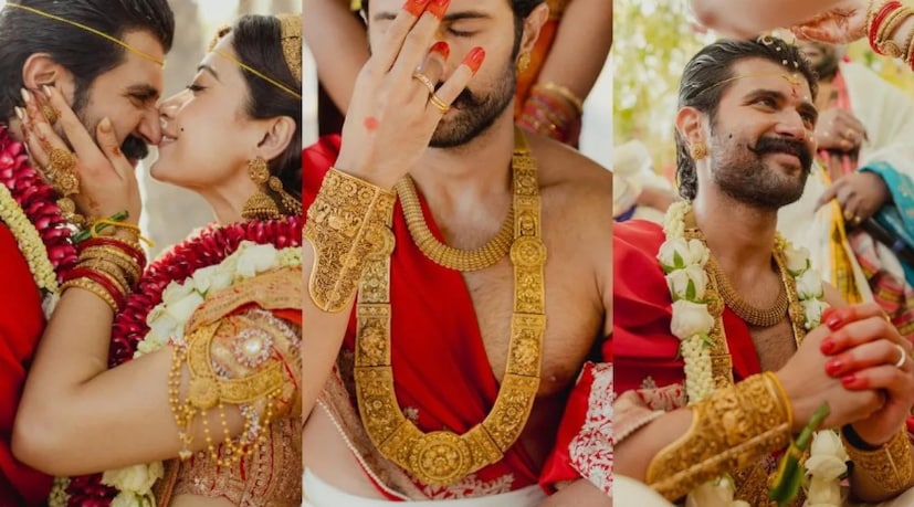 তাঁর রুক্ষ, রাজকীয় স্টাইল, ঘন গোঁফ এবং দাড়ি, পেশিবহুল শরীর নজর কাড়ছিল। ঐতিহ্যবাহী সোনার কানের দুল এবং ঐতিহ্যবাহী সোনার ব্রেসলেট দক্ষিণ ভারতীয় মহাকাব্যের বীর যোদ্ধা বরের কথা মনে করিয়ে দিচ্ছিল। তাঁর রুক্ষ, রাজকীয় স্টাইল, ঘন গোঁফ এবং দাড়ি, পেশিবহুল শরীর নজর কাড়ছিল। ঐতিহ্যবাহী সোনার কানের দুল এবং ঐতিহ্যবাহী সোনার ব্রেসলেট দক্ষিণ ভারতীয় মহাকাব্যের বীর যোদ্ধা বরের কথা মনে করিয়ে দিচ্ছিল।