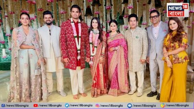কলকাতা: প্রচুর গুঞ্জন ছিল অবশেষে ফের এক গ্র্যান্ড বিয়ের সাক্ষী হল ভারতীয় ক্রিকেট ফ্যানরা৷ বেশ কয়েকদিন ধরেই সচিনের ছেলে  অর্জুন  তেন্ডুলকর এবং তাঁর বাগদত্তা সানিয়া চান্দোকের বিয়ের অনুষ্ঠান নিয়ে আগ্রহ তৈরি হচ্ছিল৷ অবশেষে সামনে এল সেই বিয়ের ফটো৷ যা এই মুহূর্তে সোশ্যাল মিডিয়ায় ভাইরাল হয়ে গেছে৷ ফ্যানরা দেখতে পারছেন ট্রেন্ড মেনে টুইনিং করেই পোশাক পরেছেন অর্জুন এবং সানিয়া৷ দুজনের পরণেই লাল-অর্জুন তেন্ডুলকর পরেছেন লাল শেরওয়ানি আর সানিয়া পরেছেন লাল টুকটুকে সোনালি কাজ করা বেনারসি৷