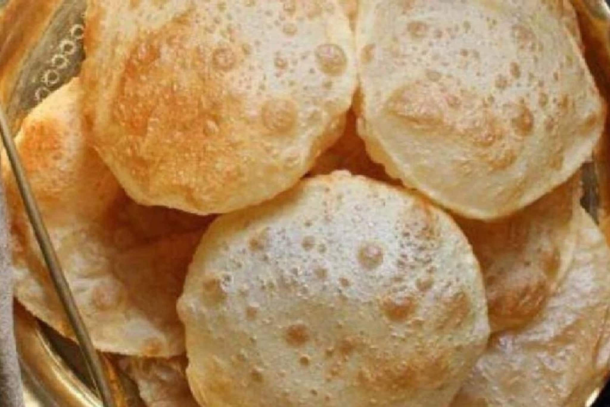 তেল ছাড়াই ফুলবে লুচি! 'এই' জিনিস দিয়ে ময়দা মাখলে হবে নরমও! ফুলকো লুচির হিট ফর্মুলা