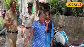 মহিলাকে আটক করে নিয়ে যাচ্ছে পুলিশ