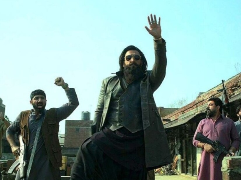 Ranveer Singh Criticize Dhruv Rathee: বলিউডে তাঁরই এখন বাজার, এবার ধ্রুব রাঠিকে একহাত নিলেন রণবীর সিং? শ্বশুরের সঙ্গে নতুন বিজ্ঞাপনে বিতর্ক Ranveer Singh Criticize Dhruv Rathee: বলিউডে তাঁরই এখন বাজার, এবার ধ্রুব রাঠিকে একহাত নিলেন রণবীর সিং? শ্বশুরের সঙ্গে নতুন বিজ্ঞাপনে বিতর্ক