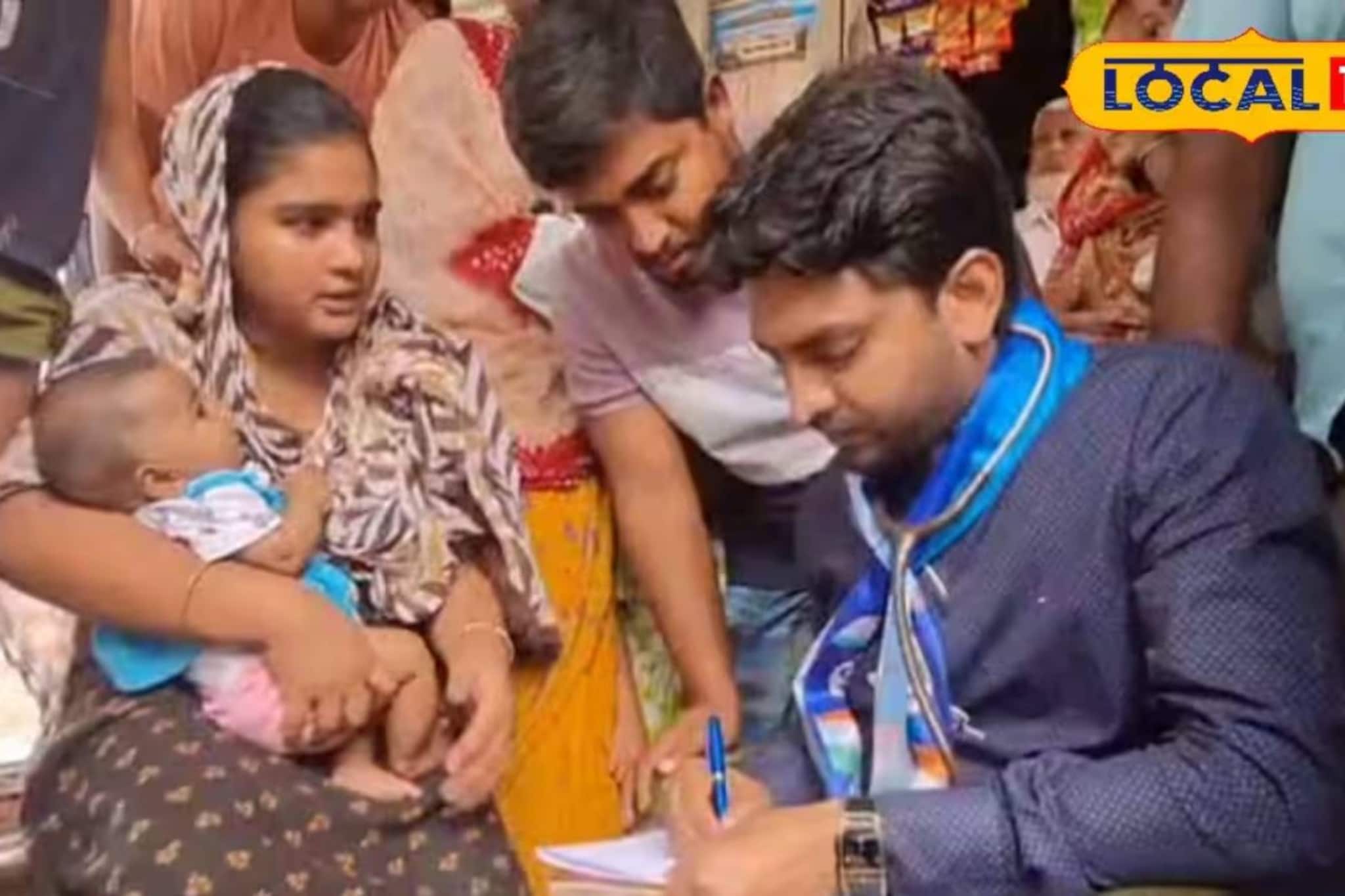 খর রোদে নির্বাচনের প্রচারে বেরিয়েই মানবিকতার নজির, গলায় স্টেথোস্কোপ নিয়ে অসুস্থ শিশুর চিকিৎসায় ব্যস্ত তৃণমূল প্রার্থী খর রোদে নির্বাচনের প্রচারে বেরিয়েই মানবিকতার নজির, গলায় স্টেথোস্কোপ নিয়ে অসুস্থ শিশুর চিকিৎসায় ব্যস্ত তৃণমূল প্রার্থী