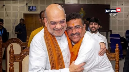 শুভেন্দু অধিকারী এবং অমিত শাহ (ফাইল ছবি) শুভেন্দু অধিকারী এবং অমিত শাহ (ফাইল ছবি)