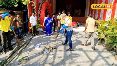 ঝাঁটা হাতে মণ্ডপ পরিষ্কার করছেন বিধায়ক