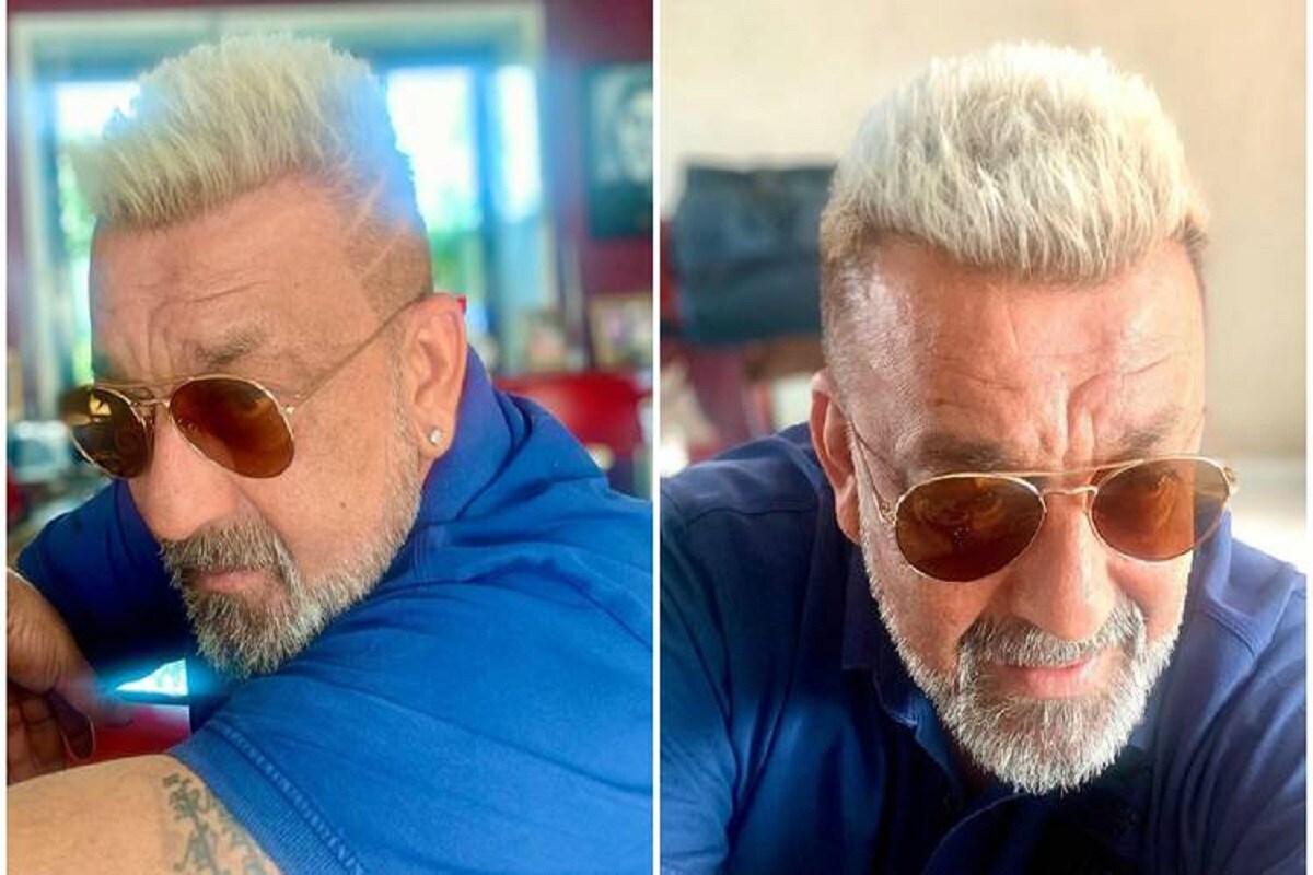 એન્ટરટેઇનમેન્ટ ડેસ્ક: એક્ટર સંજય દત્ત (Sanjay Dutt) હાલમાં જ ફેફસાનાં કેન્સર (Lung Cancer) સામે મુશ્કેલ જંગ જીત્યો છે. તેણે આ ખુશી ઓફિશિયલ સ્ટેટમેન્ટ જાહેર કરીને આપી છે. તેનાં બાળકોનાં જન્મ દિવસે તેણે આ ખુશી જાહેર કરી હતી. હવે કેન્સર સામેનો જંગ જીત્યા બાદ સંજય દત્ત તેનું સંપૂર્ણ ફોક્સ તેની અપકમિંગ ફિલ્મોનાં શૂટિંગ તરફ કરી રહ્યો છે. પણ આ વખતે તેની બીમારી કે ફિલ્મો નહીં પણ તેનો લૂક ચર્ચામાં આવી ગયો છે. તેણે હાલમાં તેનાં વાળનો કલર ચેન્જ કર્યો છે. તેણે વાળમાં પ્લેટિનમ બ્લોડ હેર (Platinum Blonde Hair) લૂક આપ્યો છે. એન્ટરટેઇનમેન્ટ ડેસ્ક: એક્ટર સંજય દત્ત (Sanjay Dutt) હાલમાં જ ફેફસાનાં કેન્સર (Lung Cancer) સામે મુશ્કેલ જંગ જીત્યો છે. તેણે આ ખુશી ઓફિશિયલ સ્ટેટમેન્ટ જાહેર કરીને આપી છે. તેનાં બાળકોનાં જન્મ દિવસે તેણે આ ખુશી જાહેર કરી હતી. હવે કેન્સર સામેનો જંગ જીત્યા બાદ સંજય દત્ત તેનું સંપૂર્ણ ફોક્સ તેની અપકમિંગ ફિલ્મોનાં શૂટિંગ તરફ કરી રહ્યો છે. પણ આ વખતે તેની બીમારી કે ફિલ્મો નહીં પણ તેનો લૂક ચર્ચામાં આવી ગયો છે. તેણે હાલમાં તેનાં વાળનો કલર ચેન્જ કર્યો છે. તેણે વાળમાં પ્લેટિનમ બ્લોડ હેર (Platinum Blonde Hair) લૂક આપ્યો છે.
