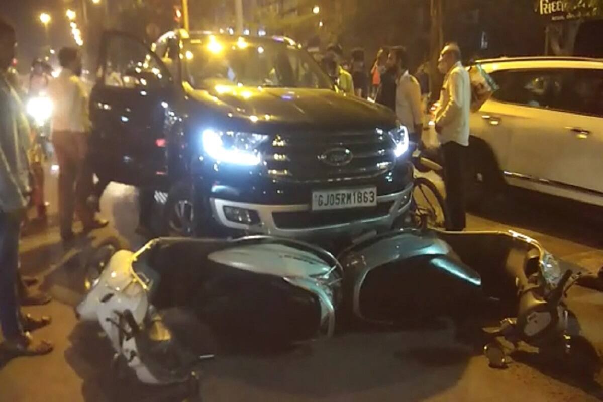 Surat hit and run Atul Bakery owners car crashes three mopeds collidewoman  killed ap– News18 Gujarati