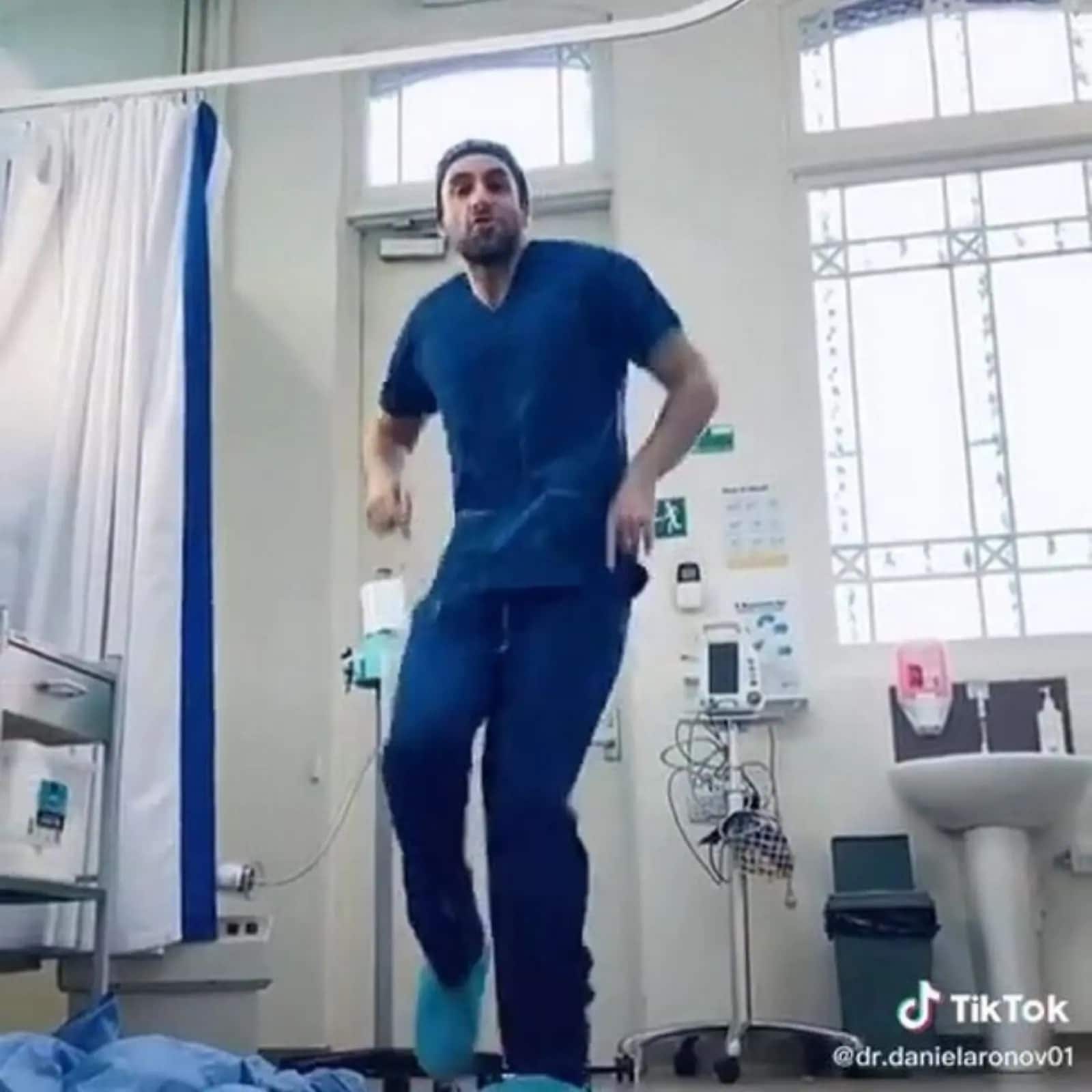 Australia surgeon dance during surgery