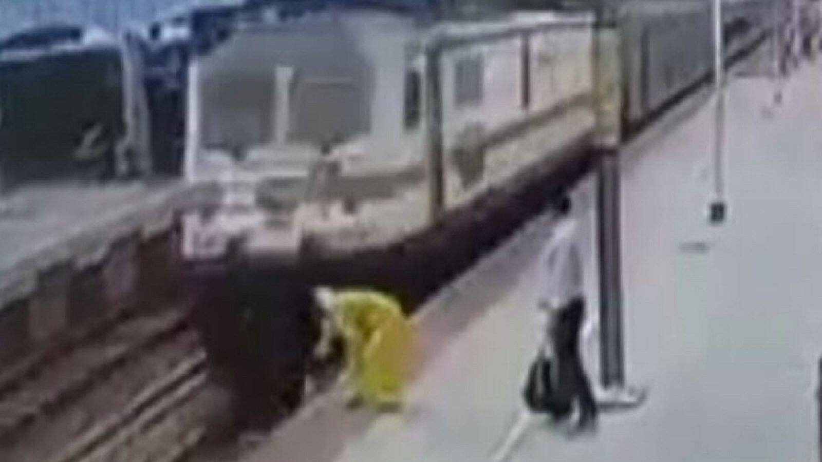 woman beat death not once but twice in two seconds while crossing a railway track રેલ્વે ટ્રેક