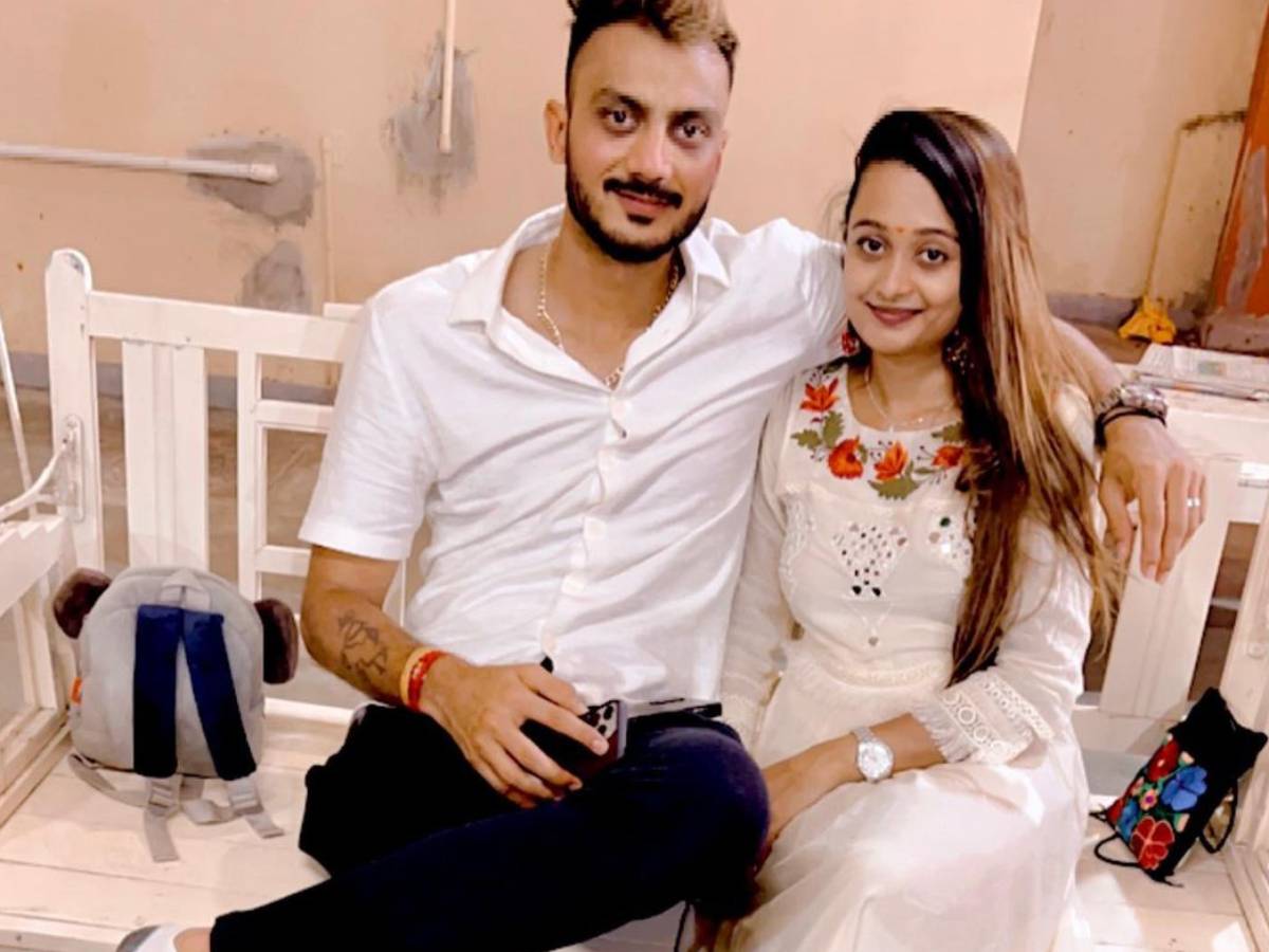 axar patel fiance meha is social media queen tatto on his hand written with  akas News18 Gujarati