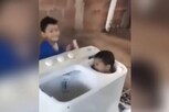 VIDEO: વોશિંગ મશીનમાં ઘુસી ગયું બાળક, એ જ સમયે બીજા બાળકે ચાલું કરી દીધું