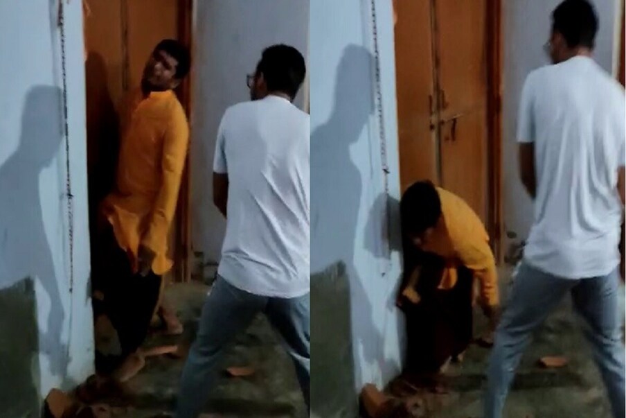  ہریانہ کے فتح آباد ضلع میں پجاری کی پٹائی کا ایک ویڈیو سوشل میڈیا پر جم کر وائرل ہورہا ہے ۔ ویڈیو میں کچھ نوجوان پجاری کو بلے اور ڈنڈوں سے پیٹ رہے ہیں ۔ (Photo: News18)