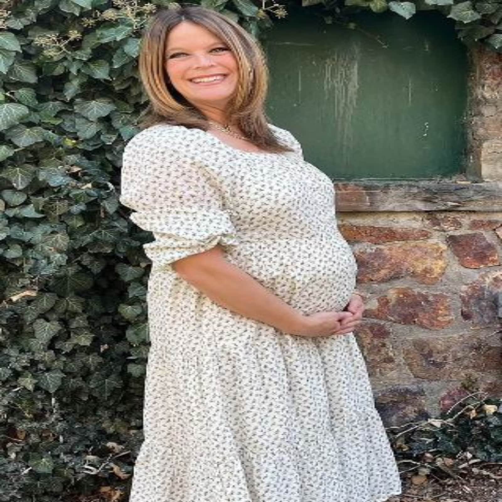 woman pregnant with grandchild