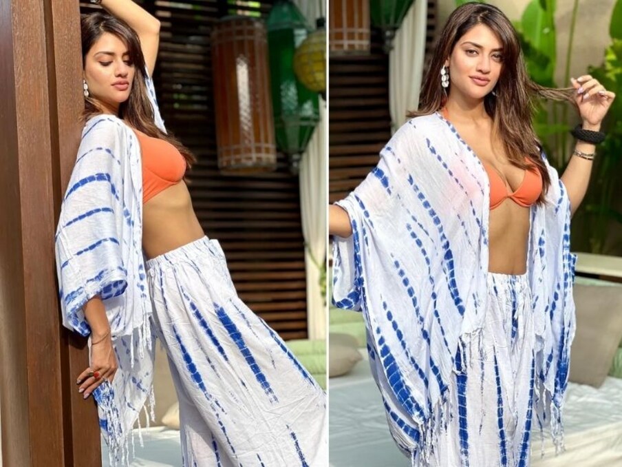  نصرت جہاں نے تازہ تصاویر کو انسٹاگرام پر شیئر کیا ہے ۔ تصاویر میں سفید اور بلیو رنگ کی ڈریس پہن رکھی ہے ۔ ساتھ ہی آرینج کلر کی برا کے ساتھ وہ کافی خوبصورت لگ رہی ہیں ۔ (Images credit- @Nusrat Jahan instagram)