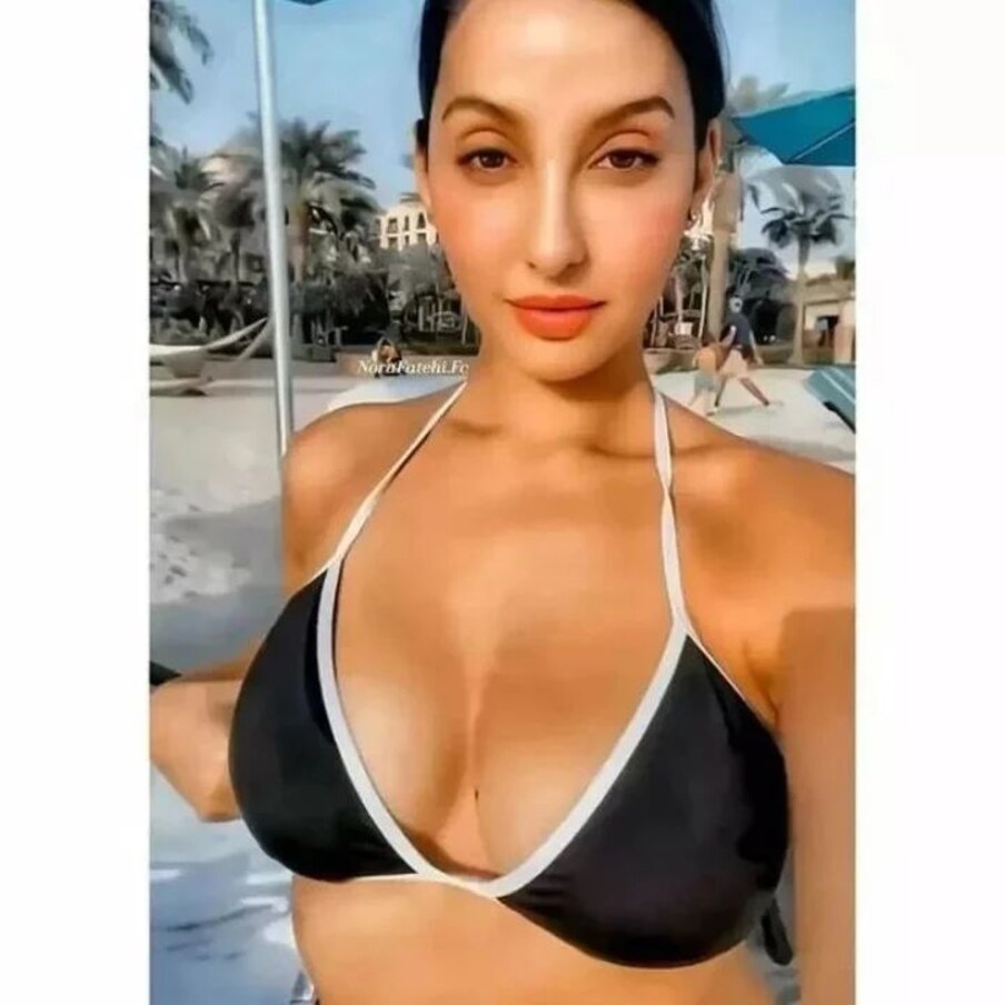  نورا فتیحی بلیک بکنی میں اپنی بولڈ ادائیں دکھا رہی ہیں ۔ تصویر : Instagram@norafatehi