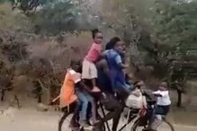 نو بچوں کے ساتھ سائیکل پر سوار شخص کی ویڈیو نے ٹوئٹر پر بحث چھیڑ دی۔