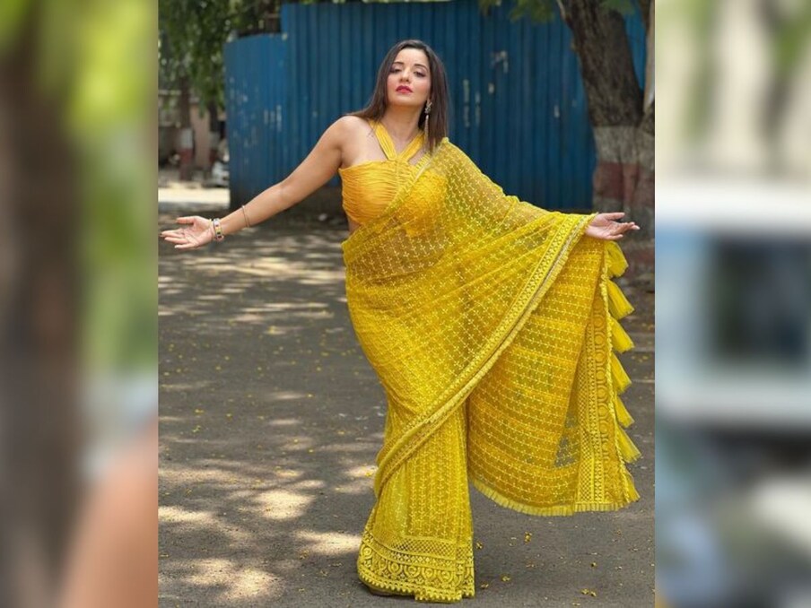 The actress completed her look with minimal makeup and silver jewellery.  Her dark lipstick, big bangs and natural hairstyle are making her look more attractive.  (Photo Source - Instagram)