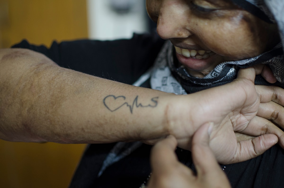  Rani got Saroj's name inked on her arm.