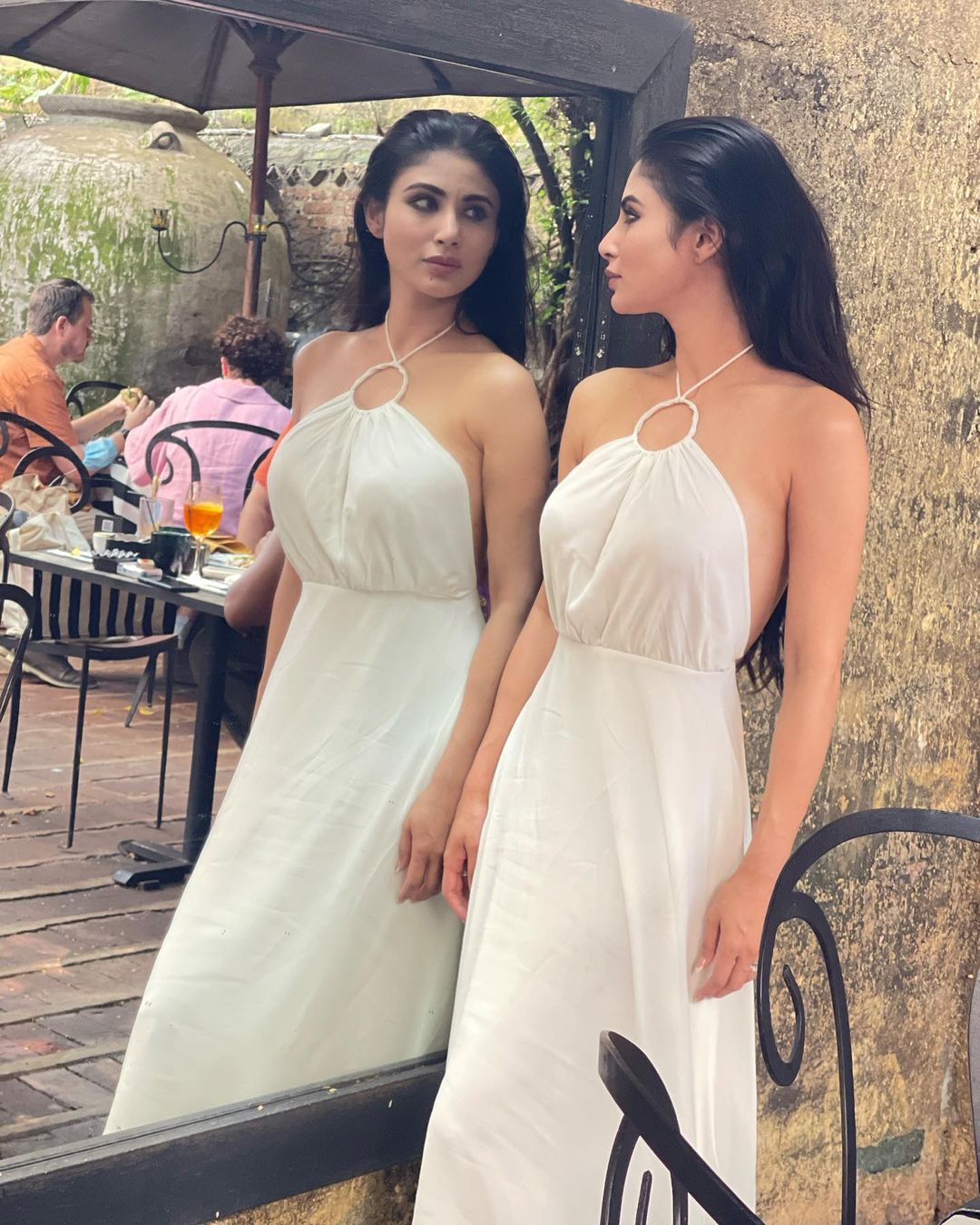  Mouni Roy looks breathtaking in the white backless dress. (Image: Instagram)