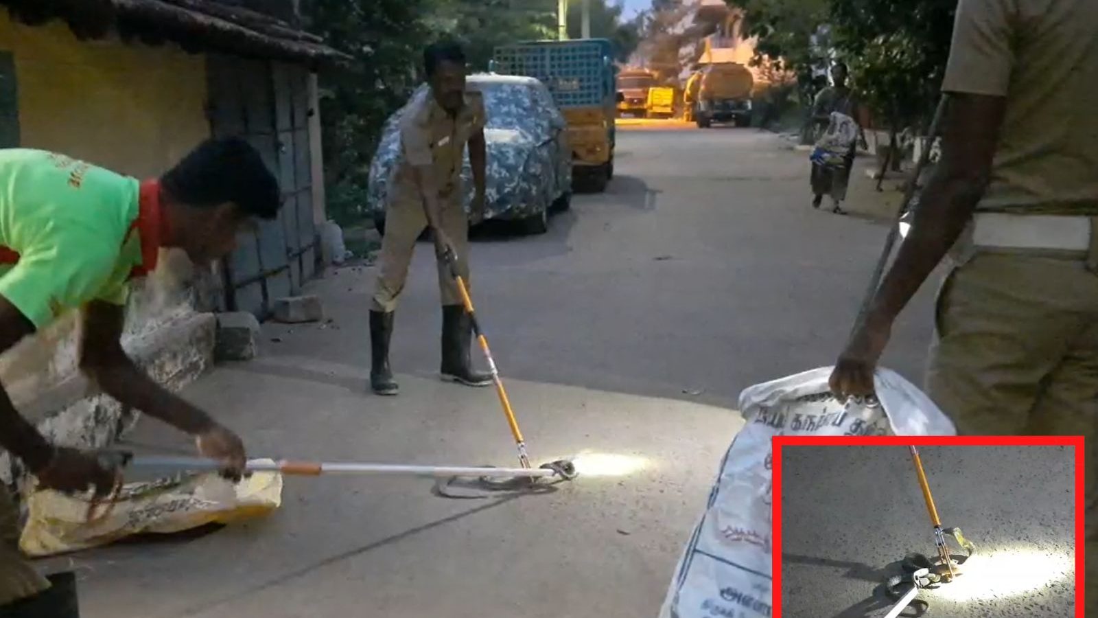 கண்ணாமூச்சி விளையாடிய நல்லபாம்பு..பீரோவின் பின் படமெடுத்தபோது பொசுக்கென்று பிடித்த தீயணைப்பு துறையினர்..