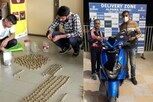 நாணய மூட்டையுடன் வந்து ஸ்கூட்டர் வாங்கிய இளைஞர்