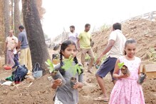 கோவை பேரூர் குளக்கரையில் 2,000 மரக்கன்றுகள்.. நடவு பணியில் சிறுவர்கள்!