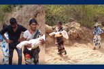 சாலை வசதி இல்லாததால் குழந்தை சடலத்துடன் தாய் 8 கி.மீ நடந்துசென்ற அவலம்