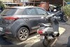 வாகனங்கள் நிற்கும் பகுதியை மட்டும் விட்டு விட்டு தார் சாலை...!