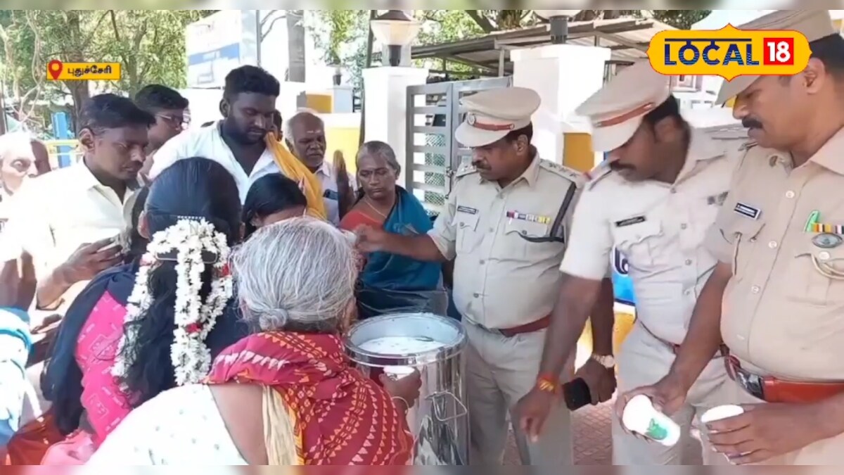 வெயிலின் தாக்கம் அதிகரிப்பு....திருநள்ளாறு கோவிலுக்கு வரும் பக்தர்களுக்கு மோர் வழங்கிய போலீசார் – News18 தமிழ்