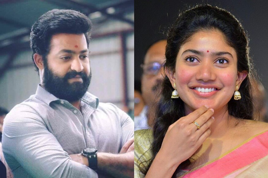 Sai Pallavi to romance with Jr NTR in RRR movie.. Rajamouli gets fidaa for the sensational actress pk.. రాజమౌళి తెరకెక్కిస్తున్న మల్టీస్టారర్ RRR గురించి ప్రత్యేకంగా చెప్పాల్సిన అవసరం లేదు. ఇదిలా ఉంటే ఈ చిత్రంలో హీరోయిన్లుగా అలియా భట్తో పాటు మరో హాలీవుడ్ బ్యూటీని సెలెక్ట్ చేసుకున్నాడు దర్శక ధీరుడు. sai pallavi,sai pallavi twitter,sai pallavi instagram,sai pallavi jr ntr,sai pallavi rrr movie,sai pallavi ss rajamouli,sai pallavi rrr movie actress,sai pallavi dance,malar sai pallavi,sai pallavi speech,premam sai pallavi,sai pallavi ngk,sai pallavai hot,sai pallavi in fidaa,actress sai pallavi,telugu cinema,rrr movie shooting,rrr movie updates,rrr ram charan ntr,రామ్ చరణ్ ఎన్టీఆర్,ఆర్ఆర్ఆర్ షూటింగ్,ఎన్టీఆర్కు జోడీగా సాయి పల్లవి,రాజమౌళి సాయి పల్లవి,తెలుగు సినిమా