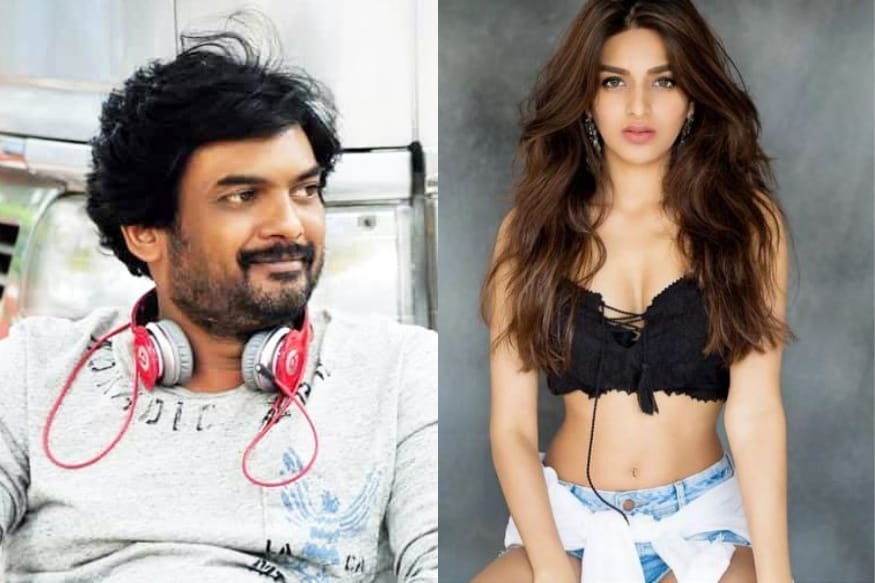 Nidhhi Agerwal lost her passport.. Puri Jagannadh changed shooting plan for Ismart Shankar movie pk.. ఈ రోజుల్లో సూపర్ ఫాస్ట్ ఎక్స్ ప్రెస్ మాదిరి సినిమాలు తెరకెక్కించే దర్శకులు చాలా తక్కువ. పక్కా ప్లానింగ్ చేసుకుని సినిమాను పూర్తి చేయడంలో పూరీ జగన్నాధ్ అందరికంటే ముందుంటాడు. ఈయన ప్లానింగ్ వేసాడంటే తిరుగుండదు. Nidhhi Agerwal,Nidhhi Agerwal twitter,Nidhhi Agerwal passport lost,Nidhhi Agerwal puri jagannadh,Nidhhi Agerwal ismart shankar movie,Nidhhi Agerwal ram pothineni,Nidhhi Agerwal movies,Nidhhi Agerwal hot photoshoot,Nidhhi Agerwal puri jagannadh serious,ismart shankar shooting,ismart shankar shooting cancelled,telugu cinema,నిధి అగర్వాల్,పూరీ జగన్నాథ్,నిధి అగర్వాల్ పూరీ జగన్నాథ్,ఇస్మార్ట్ శంకర్ నిధి అగర్వాల్,పాస్ట్ పోర్ట్ పోగొట్టుకున్న నిధి అగర్వాల్,తెలుగు సినిమా